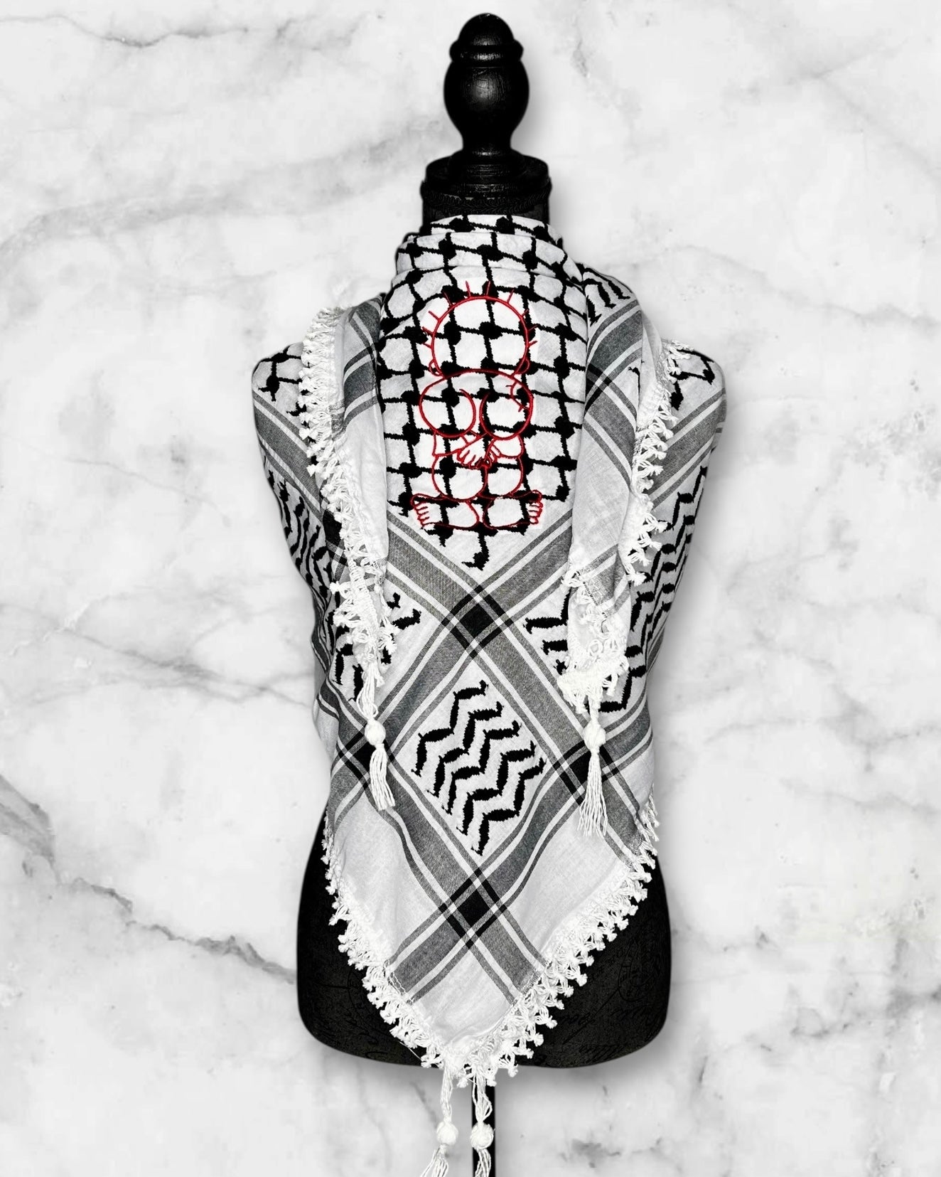 Embroidered keffiyehs with different colors and designs to choose from